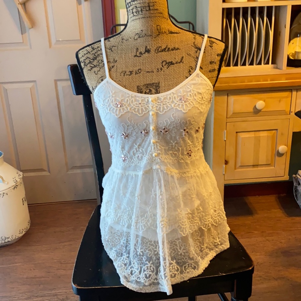 Spaghetti straps cream colored top